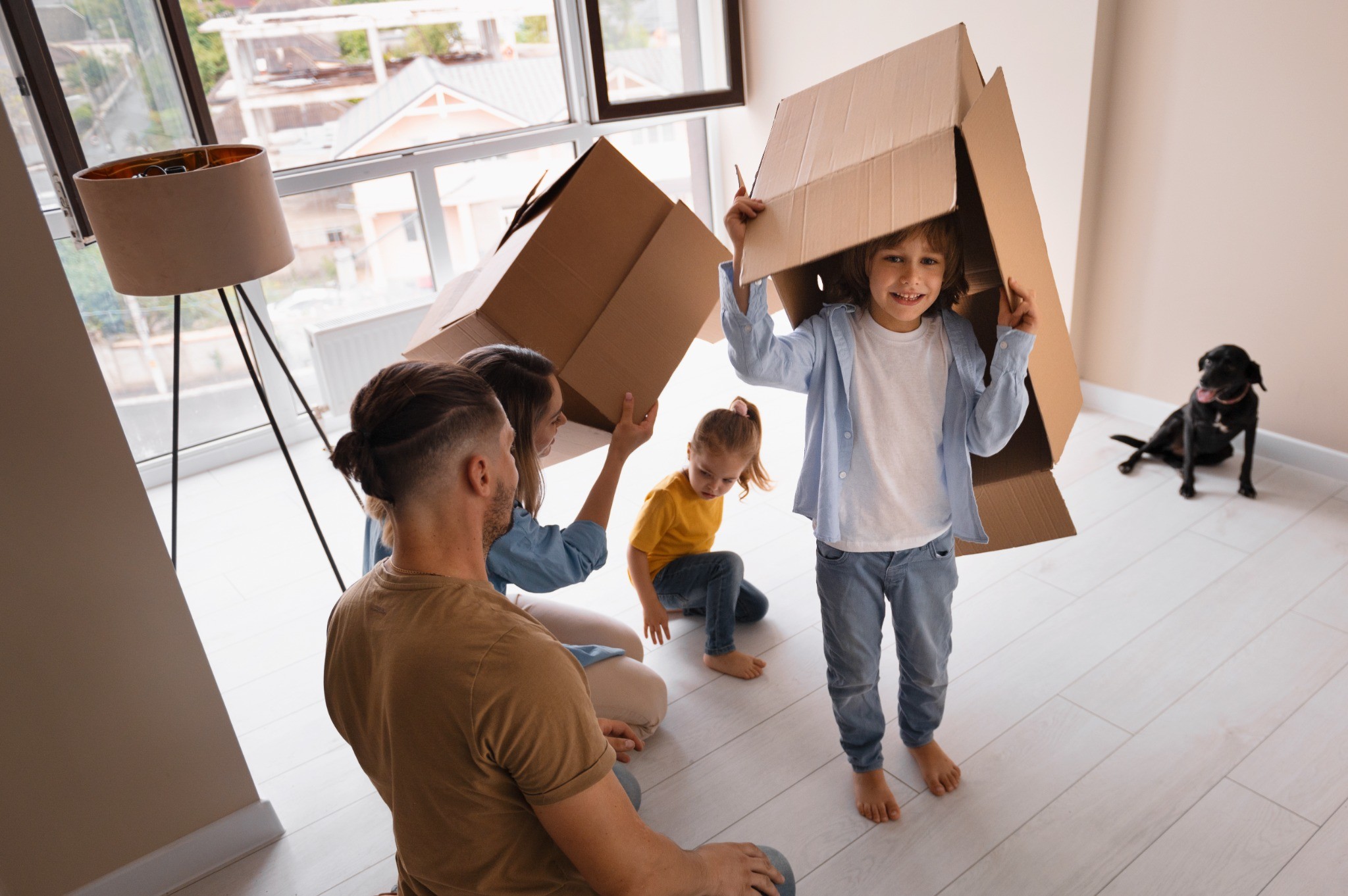 happy-family-with-dog-moving-new-home (1)